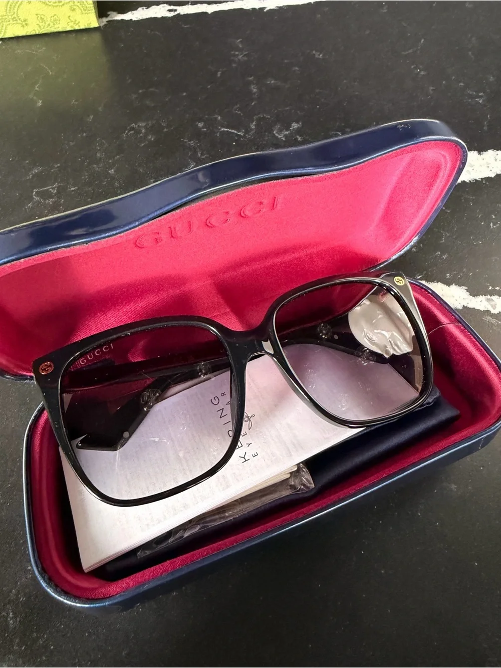 Gucci Black Frame Sunglasses with Gradient Purple Lenses